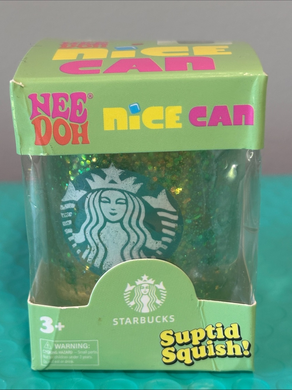 Nee Doh Starbucks Green Glitter Nice Can Suptid Squish